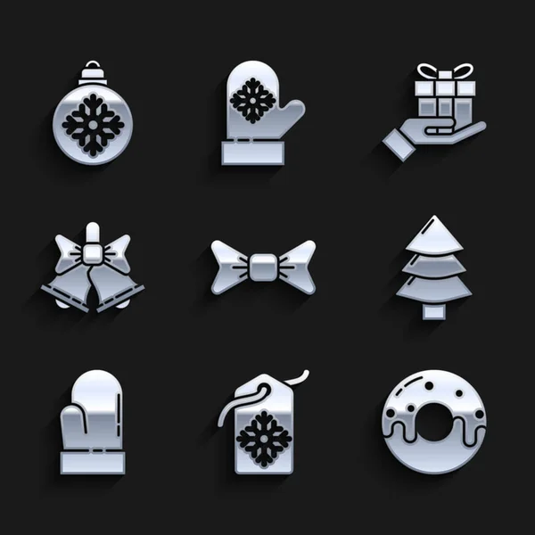 Set gravata arco, Preço tag com uma inscrição Venda, Donut esmalte doce, árvore de Natal, mitene, sino alegre, mão caixa de presente e ícone de bola. Vetor — Vetor de Stock