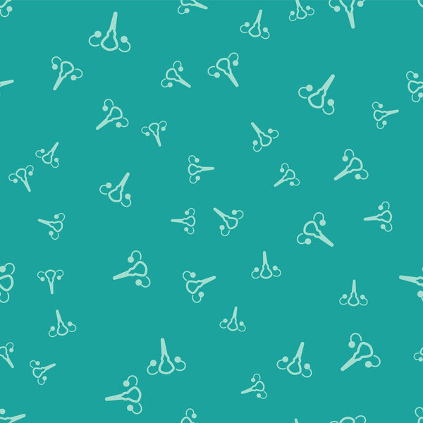 Зеленая иконка женской репродуктивной системы выделена плавным рисунком на зеленом фоне. Анатомия. Гинекология. Женское здоровье. Вектор