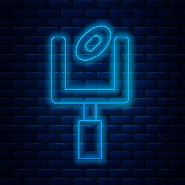 Parlayan neon hattı Amerikan futbolu kale direği ve duvar arkasında izole edilmiş futbol topu ikonu. Vektör