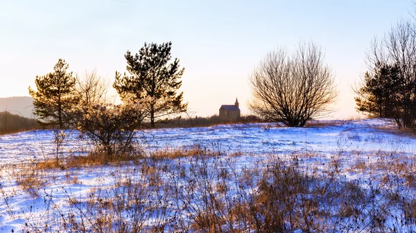 Guegel kapel zonsondergang in de Winter — Stockfoto