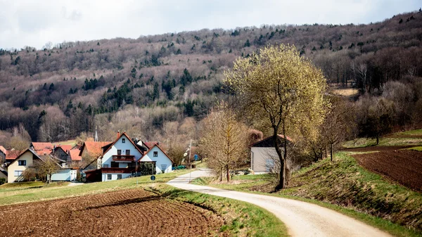 Początku wioska wiosna — Zdjęcie stockowe