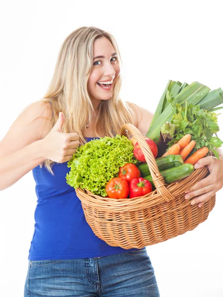 Young healthy beautiful woman with a basket full of fresh vegeta — Stock Photo, Image