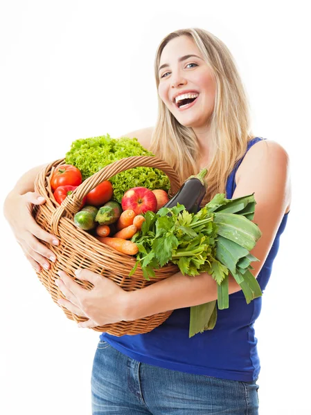 Young healthy beautiful woman with a basket full of fresh vegeta — Stock Photo, Image