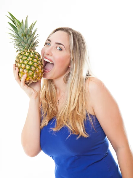 Young healthy beautiful woman with a pineapple — Stock Photo, Image