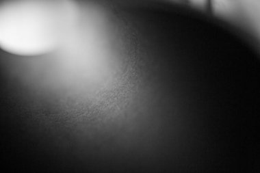 Işıklı soyut siyah arkaplan. Stüdyo arkaplanı olarak iyi kullanılacak 