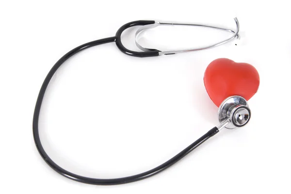 En konceptuell stetoskop på hjärtat — Stockfoto