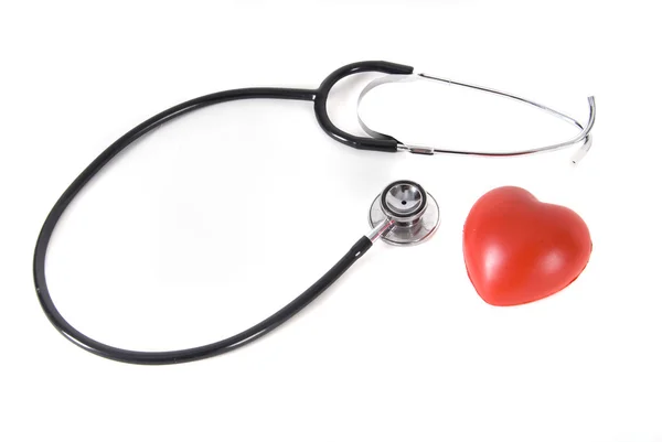 En konceptuell stetoskop på hjärtat — Stockfoto