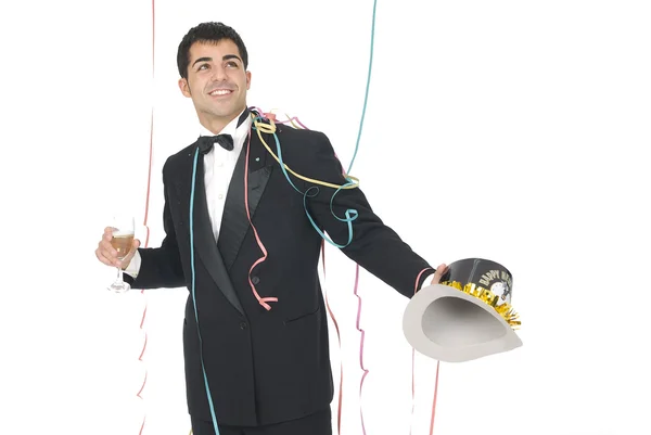 Man viering van Nieuwjaar op een feestje met hoed en champagne — Stockfoto