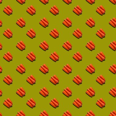 Renkli arka planda taze, sulu havuçların kusursuz deseni..