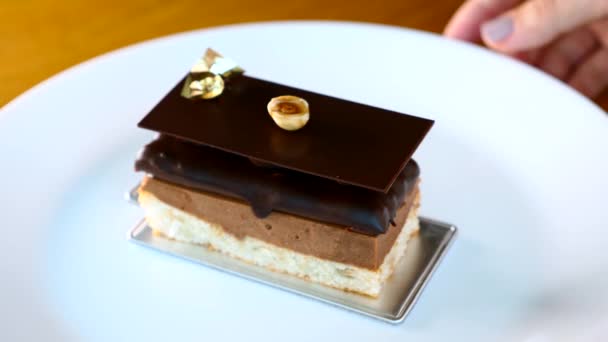 Chef Woman Hand Rotate White Plate with Opera Cake Dessert in Restaurant — Stock Video