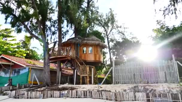 Unusual Wooden Treehouse with Rays of Sunset on Background — Stock Video