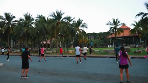 Back View of Dancing Peoples on Group Training in Public City Park — Stock Video