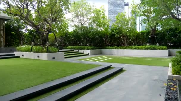 Walk On Trees Garden for Residents on Rooftop of Residential Apartments Building — Stock Video