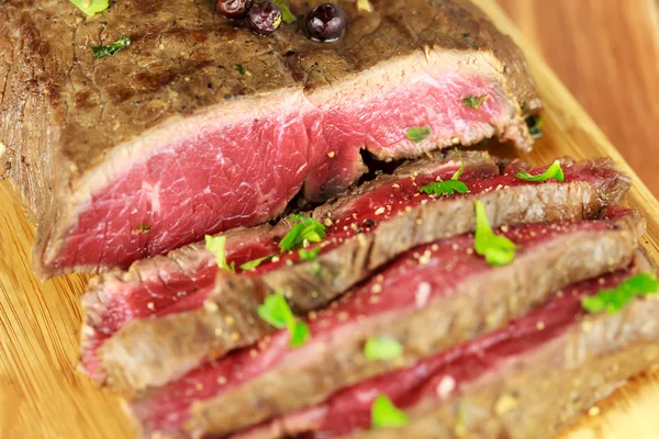 Delicious dinner of rare sliced roast beef — Stock Photo, Image