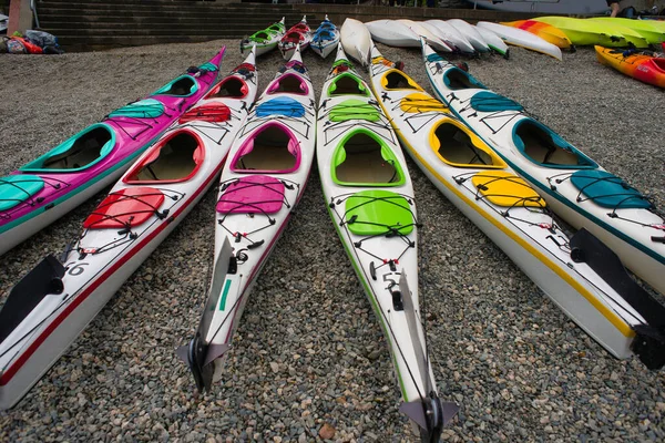 Colourful Kayaks on the shore of Deep Cove.   North Vancouver BC Canada