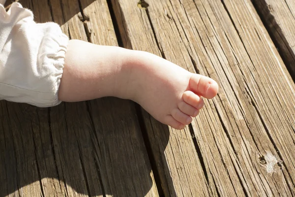 Chubby bare baby feet Stock Picture