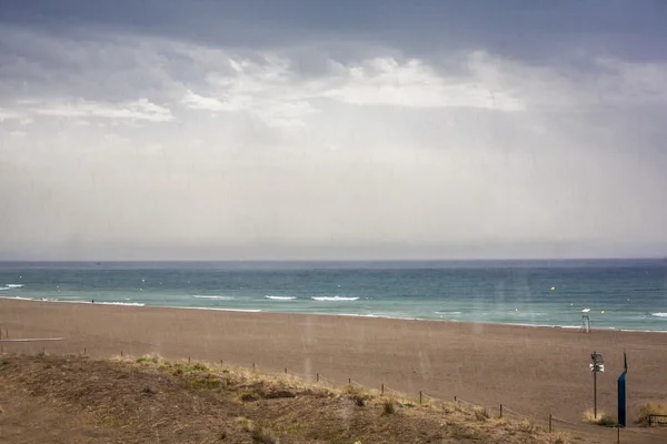 Rainy day on the beach — Stok fotoğraf