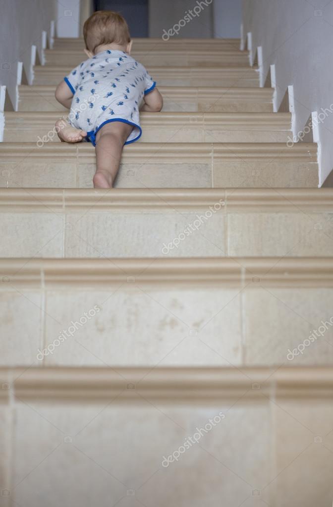 when do babies crawl up stairs