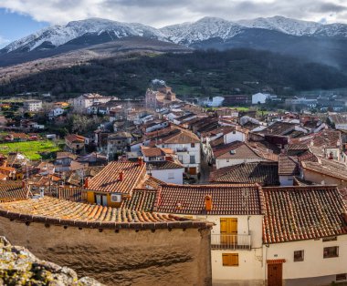 Viewpoint of Santa Maria Church, Ambroz Valley village. Caceres, Extremadura, Spain clipart