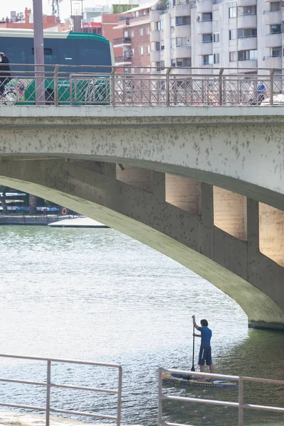 Paddle Surfer Triana Bridge Seville Spain Guadalquivir River Sports Activities — Stock Photo, Image