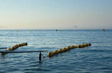 Küpeşteler ve gün batımı