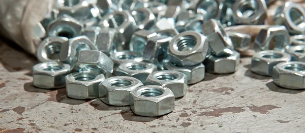 Load of new alloy nuts — Stock Photo, Image