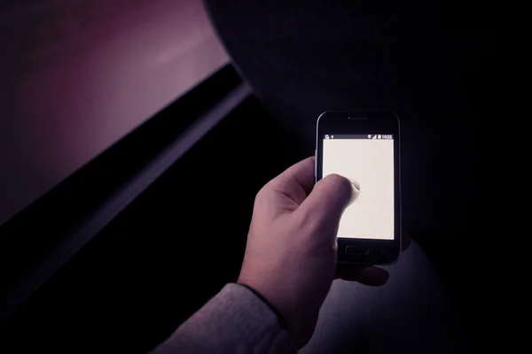Smartphone in the bus — Stock Photo, Image