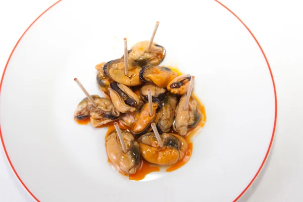 Mussels with toothpicks — Stock Photo, Image