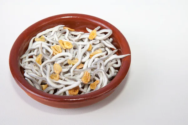 Bowl with imitation young eels cooked — Stock Photo, Image