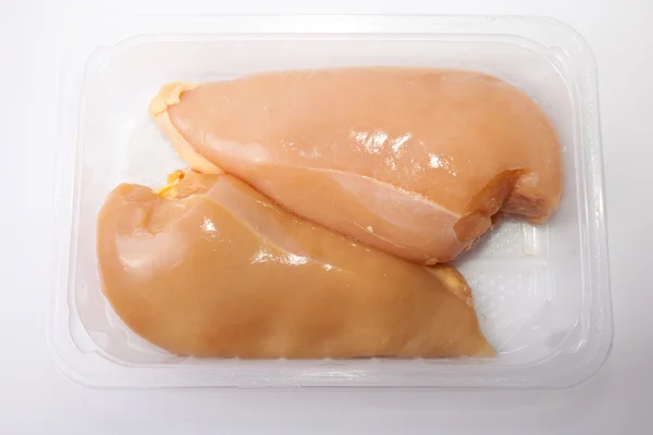 Chicken breasts on tray — Stock Photo, Image