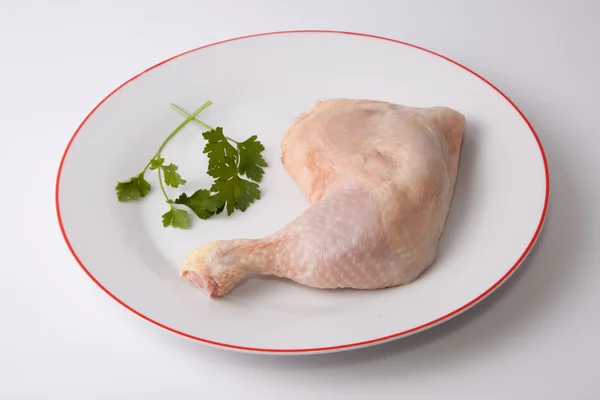 Chicken leg with parsley — Stock Photo, Image