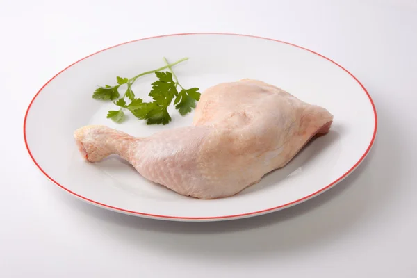 Chicken leg with parsley — Stock Photo, Image