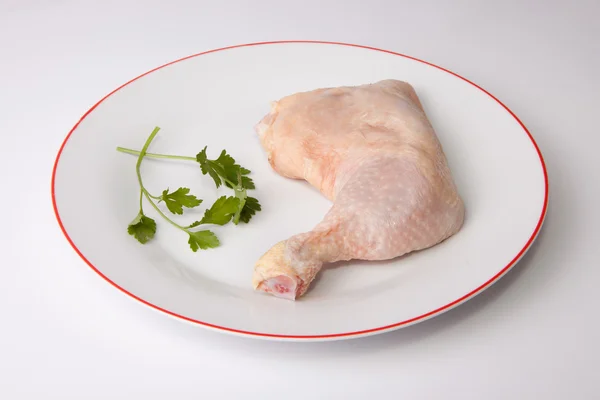 Chicken leg with parsley — Stock Photo, Image