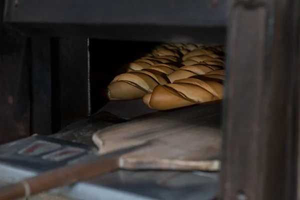 Piekarnik wewnątrz mnóstwo chleb — Zdjęcie stockowe