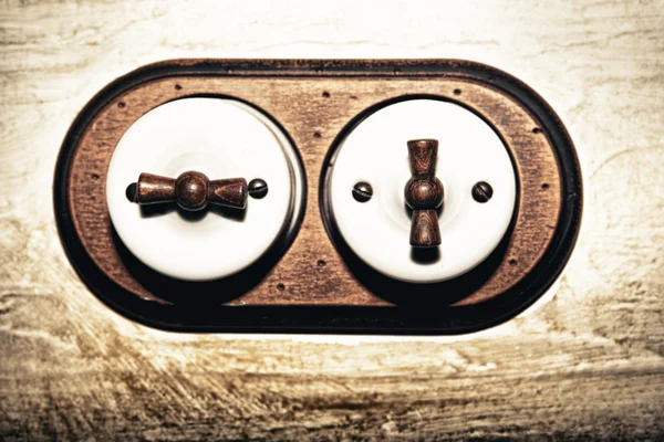 Ancient style double light switch — Stock Photo, Image