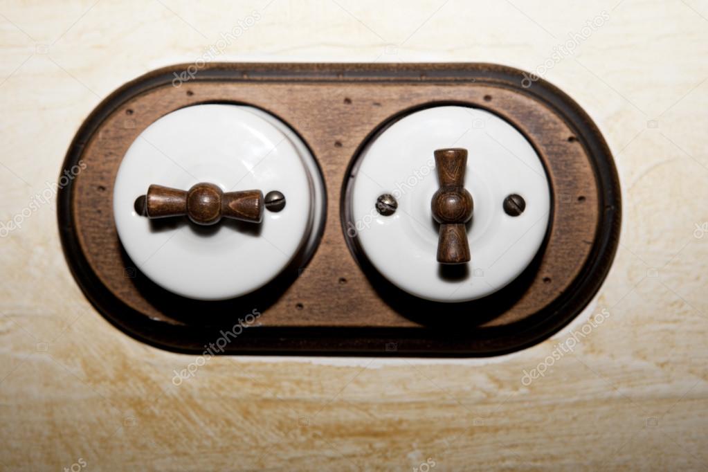 Ancient style double light switch — Stock Photo © Juan_G_Aunion 67416779