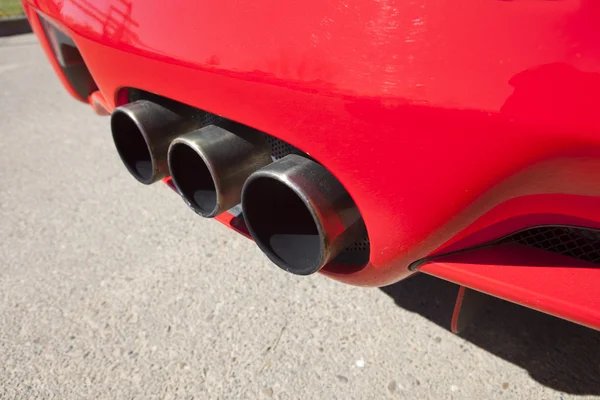 Sports car exhaust pipe Stock Photo