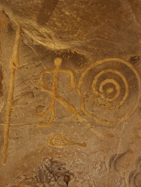 Ancient petroglyph with hunters figures — Stock Photo, Image