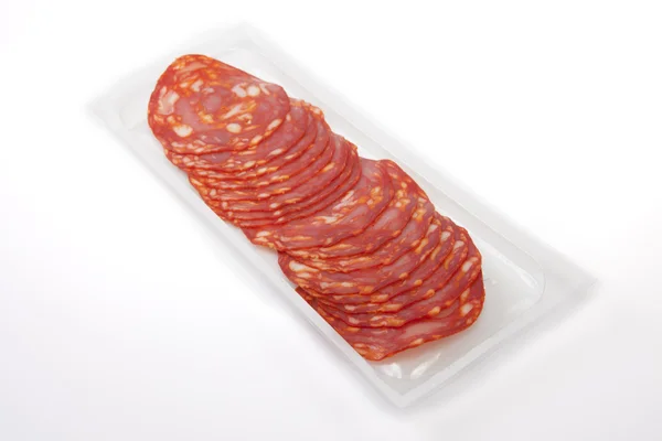 Fette di chorizo rosso sulla confezione — Foto Stock