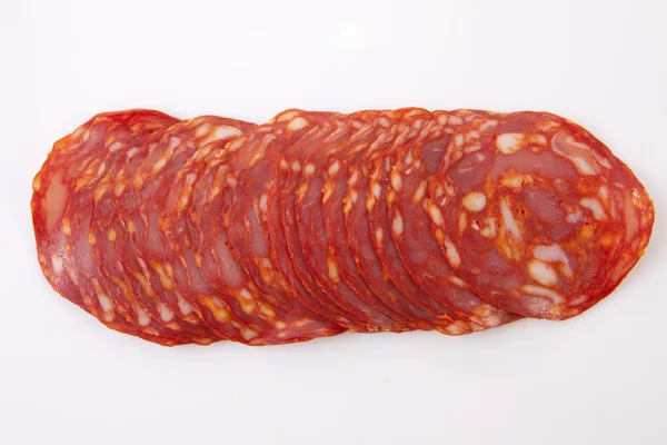 Tagliare fette di chorizo iberico rosso — Foto Stock