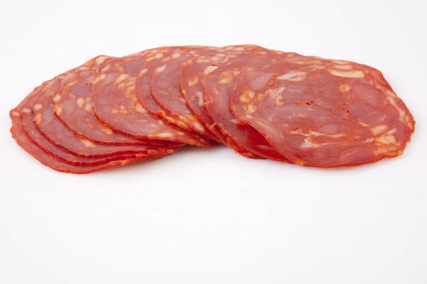 Tagliare fette di chorizo iberico rosso — Foto Stock