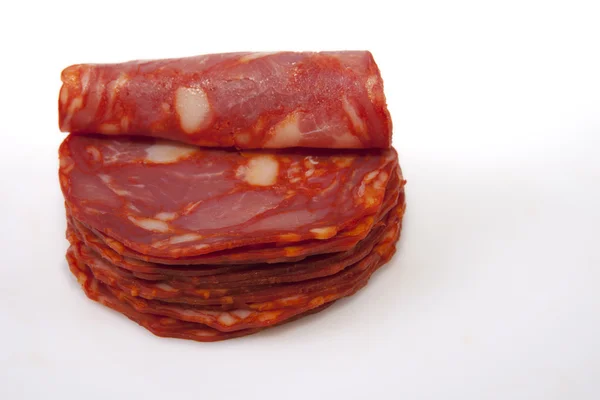 Corte fatias de chouriço ibérico vermelho — Fotografia de Stock