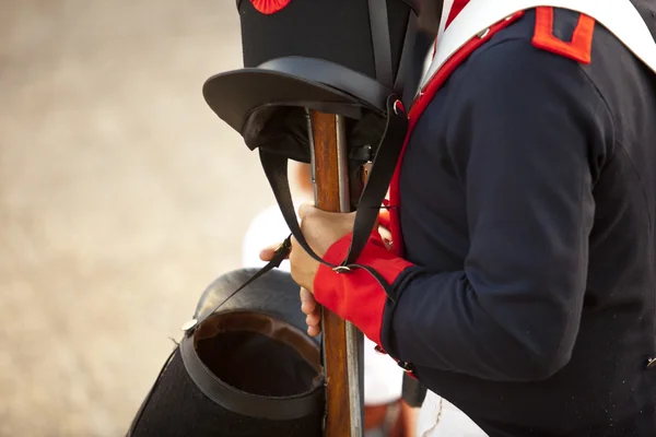 Hats and muskets — Stock Photo, Image