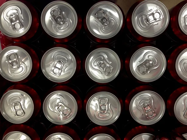 Red tins of beer — Stok fotoğraf