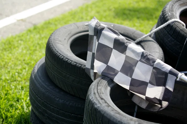 Checkered flag resting — Stock Photo, Image