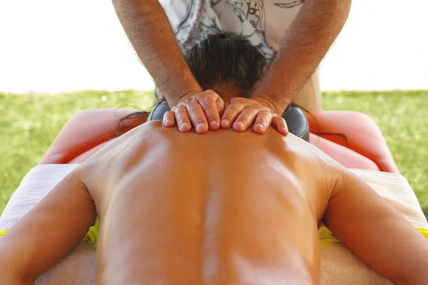 Massage therapist in action — Stock Photo, Image