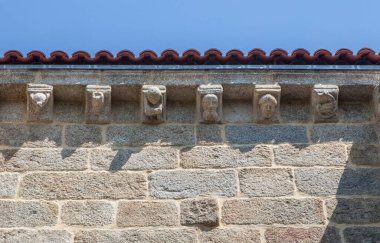 Corbels of Parish Church of Santo Domingo. Ribadavia old town, Orense, Spain