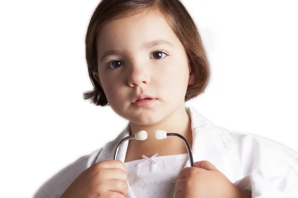Aranyos lány egy klinikai higany-üveg hőmérő — Stock Fotó
