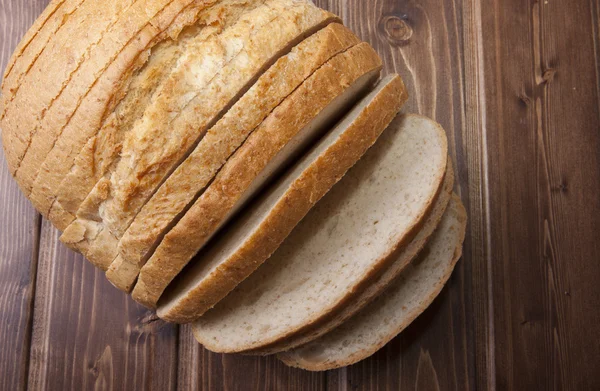 Bread roll in cuts — Stock Photo, Image