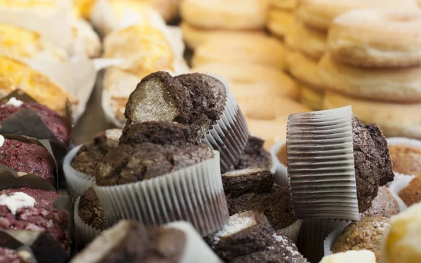 Fresh made muffins and donuts — Stock Photo, Image